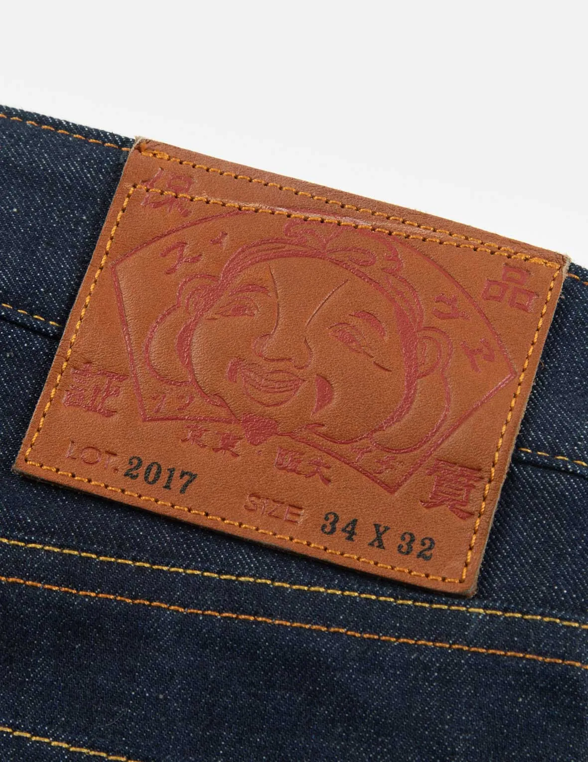 Eagle and Kamon-pattern Pocket Carrot-Fit Jeans #2017